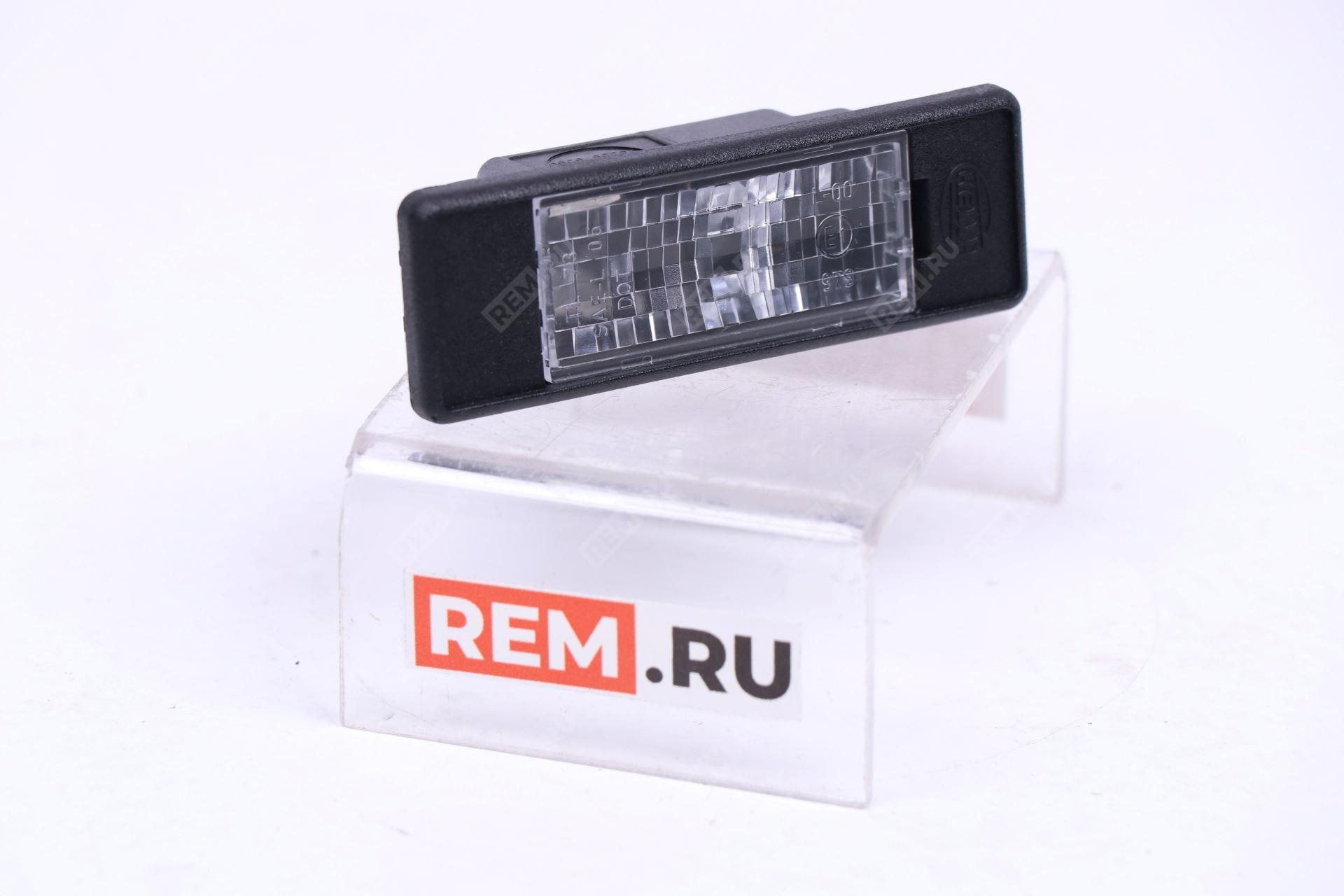 Фонарь подсветки номерного знака Nissan 26510AU300 фонарь подсветки номерного знака (фото 1)